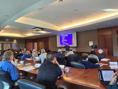 Steve Young presents to students.