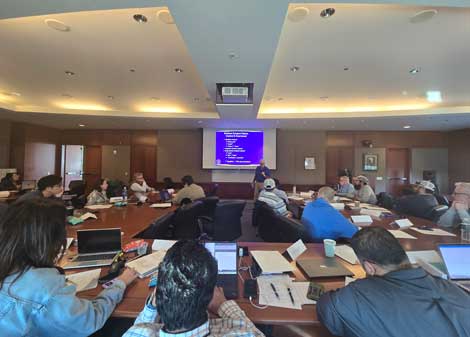 Steve Young presents to students.